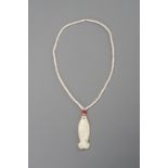 A STONE NECKLACE WITH A 'FISH' JADE PENDANT