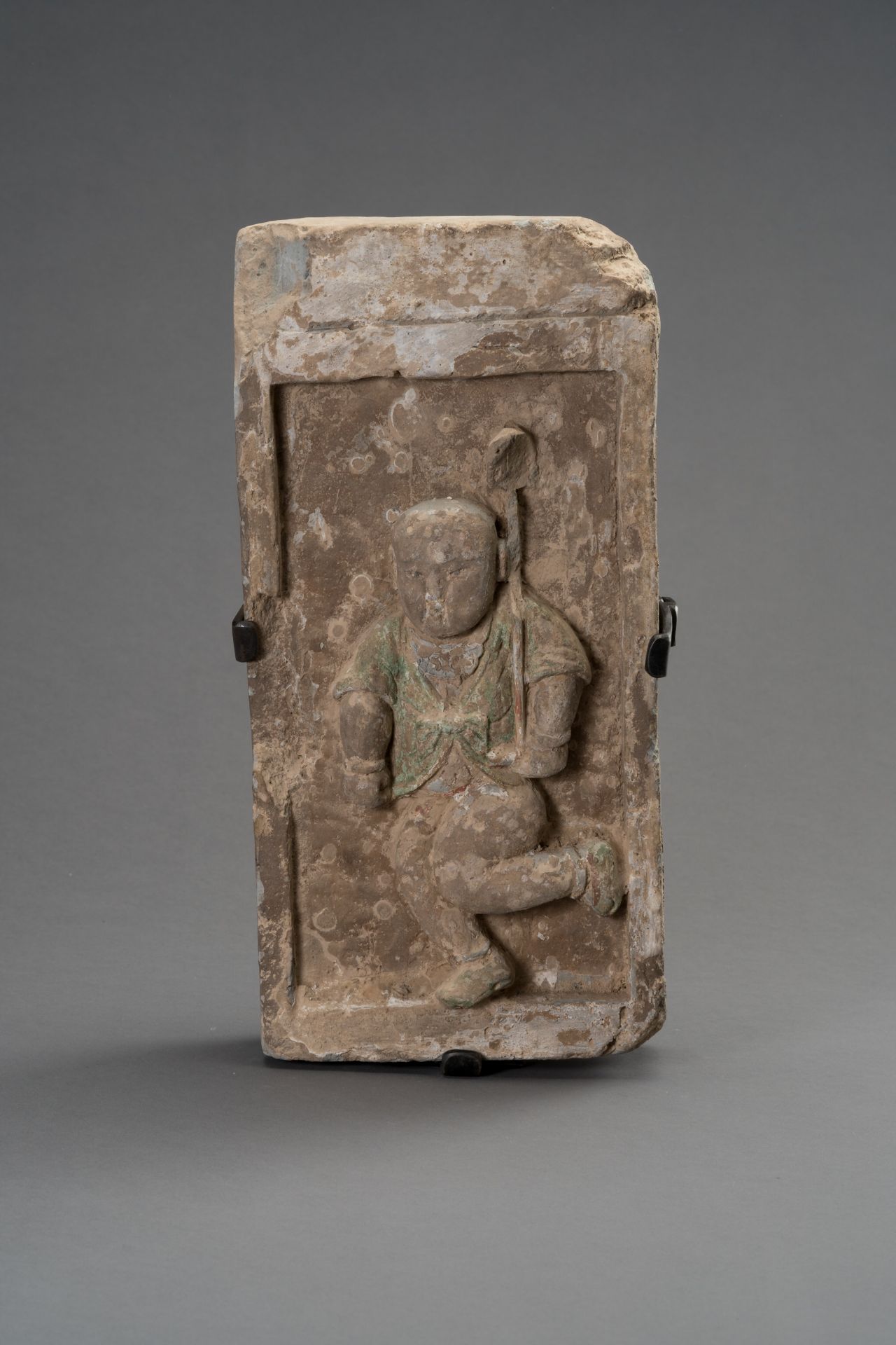 A TERRACOTTA BRICK DEPICTING A CHILD WITH STANDARD, SONG DYNASTY