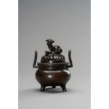 A SMALL BRONZE 'BRAIDED' TRIPOD CENSER, QING DYNASTY