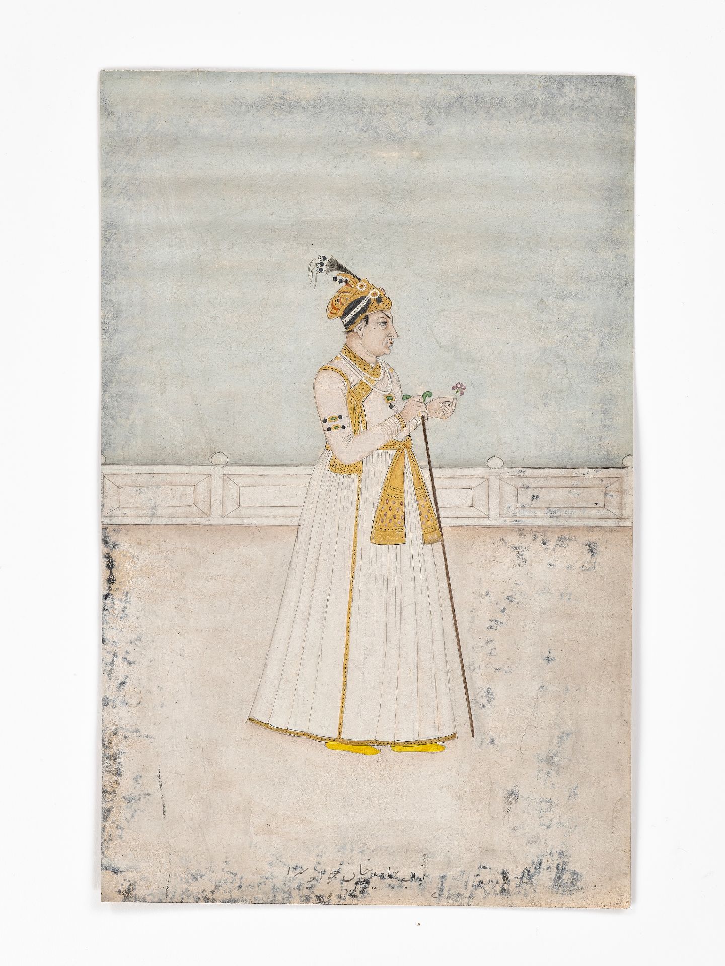 AN INDIAN MINIATURE PAINTING OF A MUGHAL COURTIER