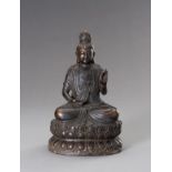 A BRONZE FIGURE OF SEATED GUANYIN, 20TH CENTURY