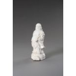 A DEHUA PORCELAIN FIGURE OF BUDAI, 20TH CENTURY