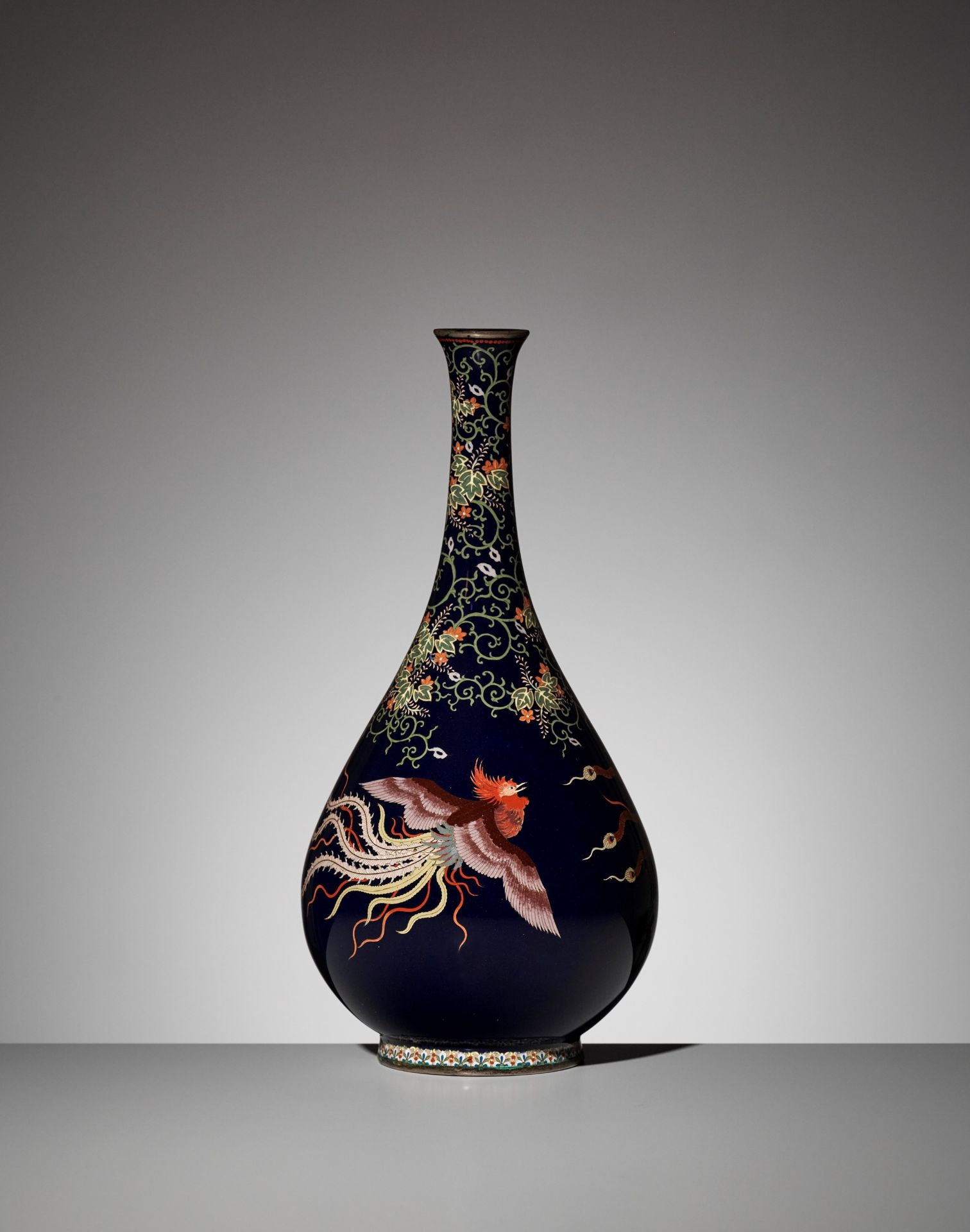 A SUPERB MIDNIGHT-BLUE CLOISONNÃ‰ VASE DEPICTING HO-O BIRDS AND KIRI LEAVES