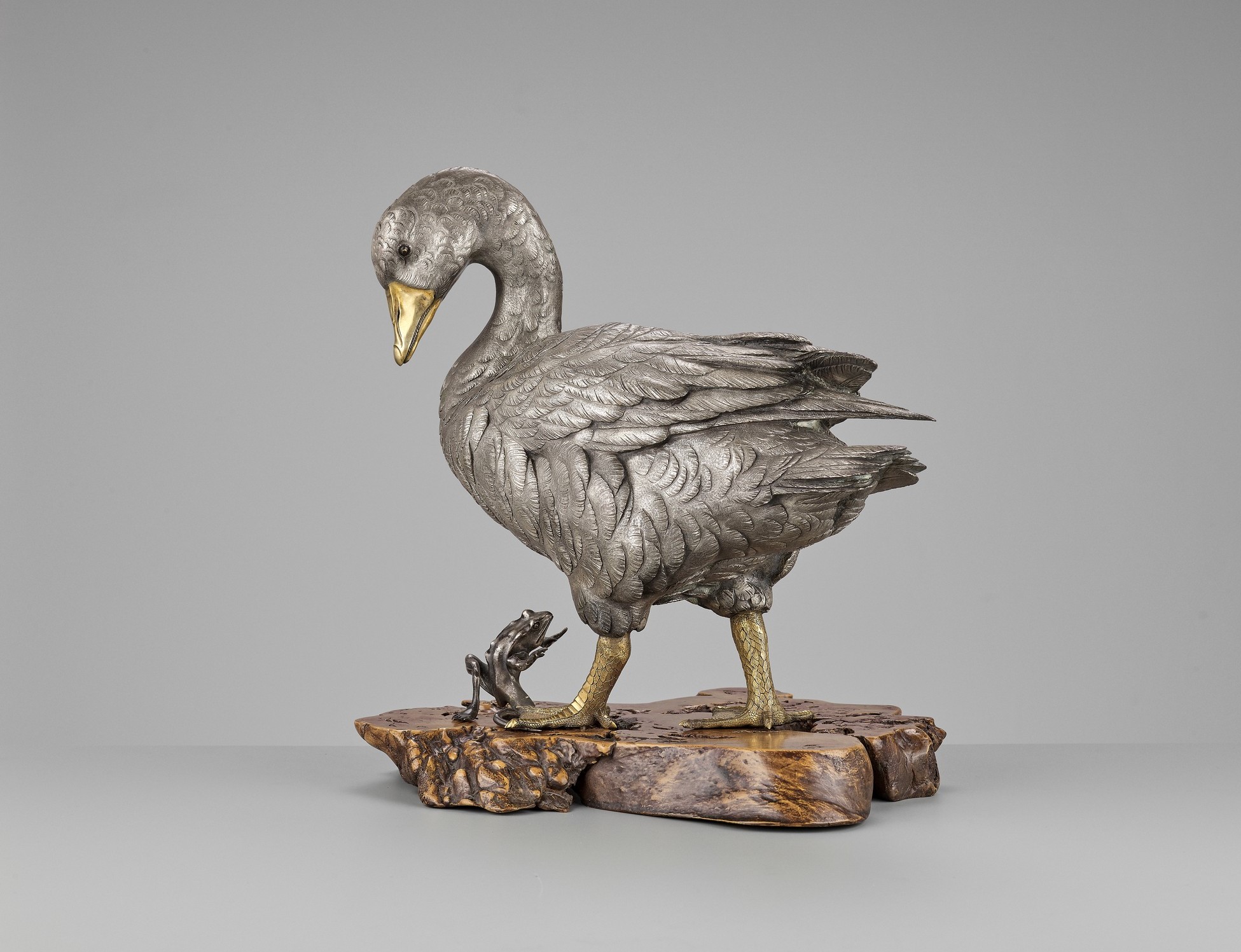 SEIJI: A LARGE SILVERED OKIMONO OF A GOOSE