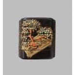 AN UNUSUAL INLAID BLACK AND GOLD LACQUER FOUR-CASE INRO DEPICTING BONSAI TREES