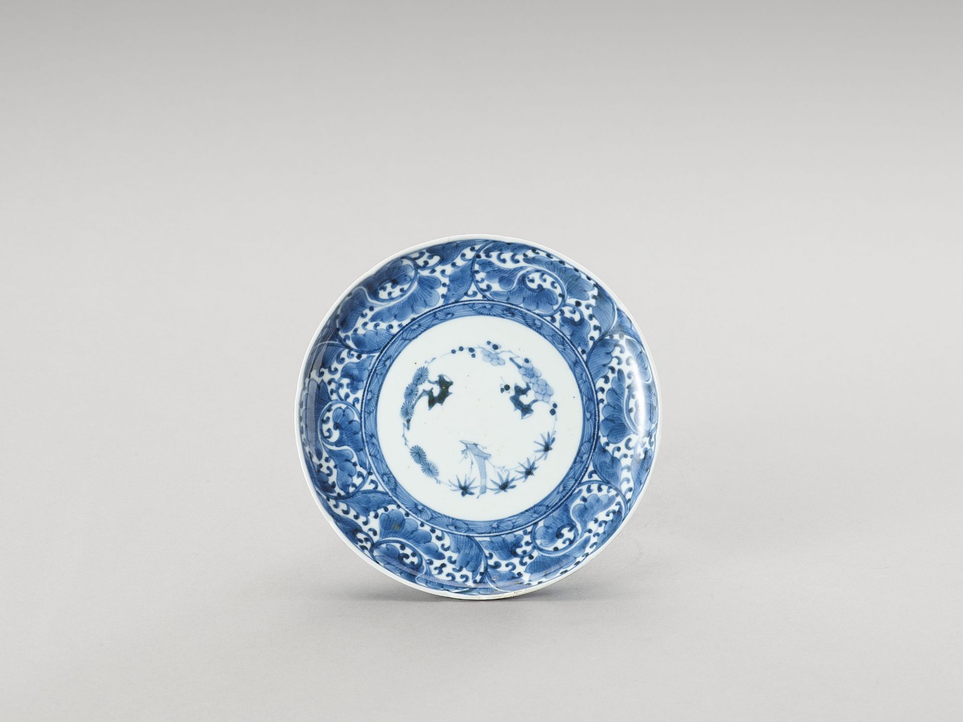 A BLUE AND WHITE ARITA PORCELAIN 'FLORAL' DISH