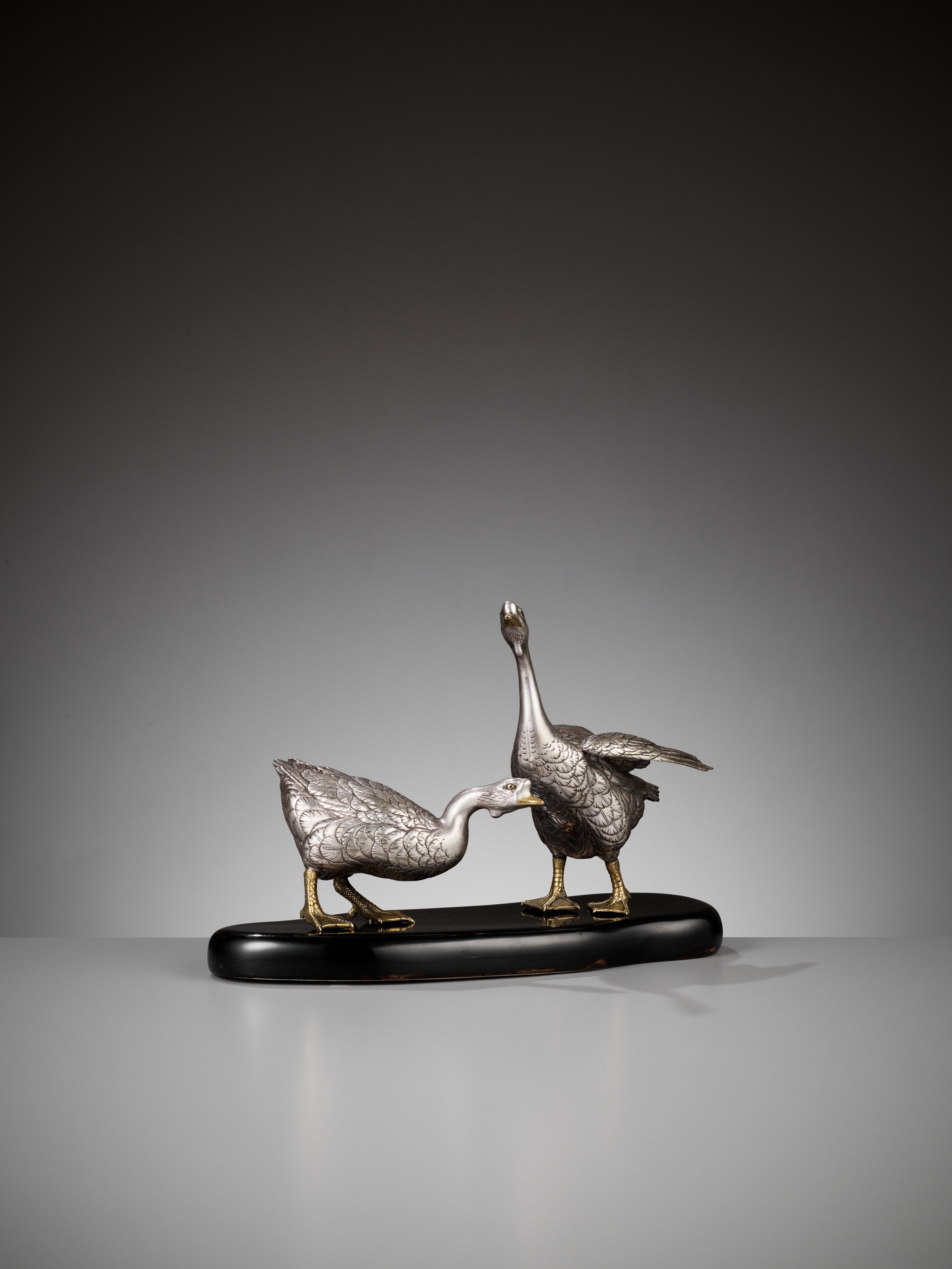 CHIKAYOSHI: A GILT AND SILVERED BRONZE OKIMONO OF TWO GEESE - Image 8 of 9