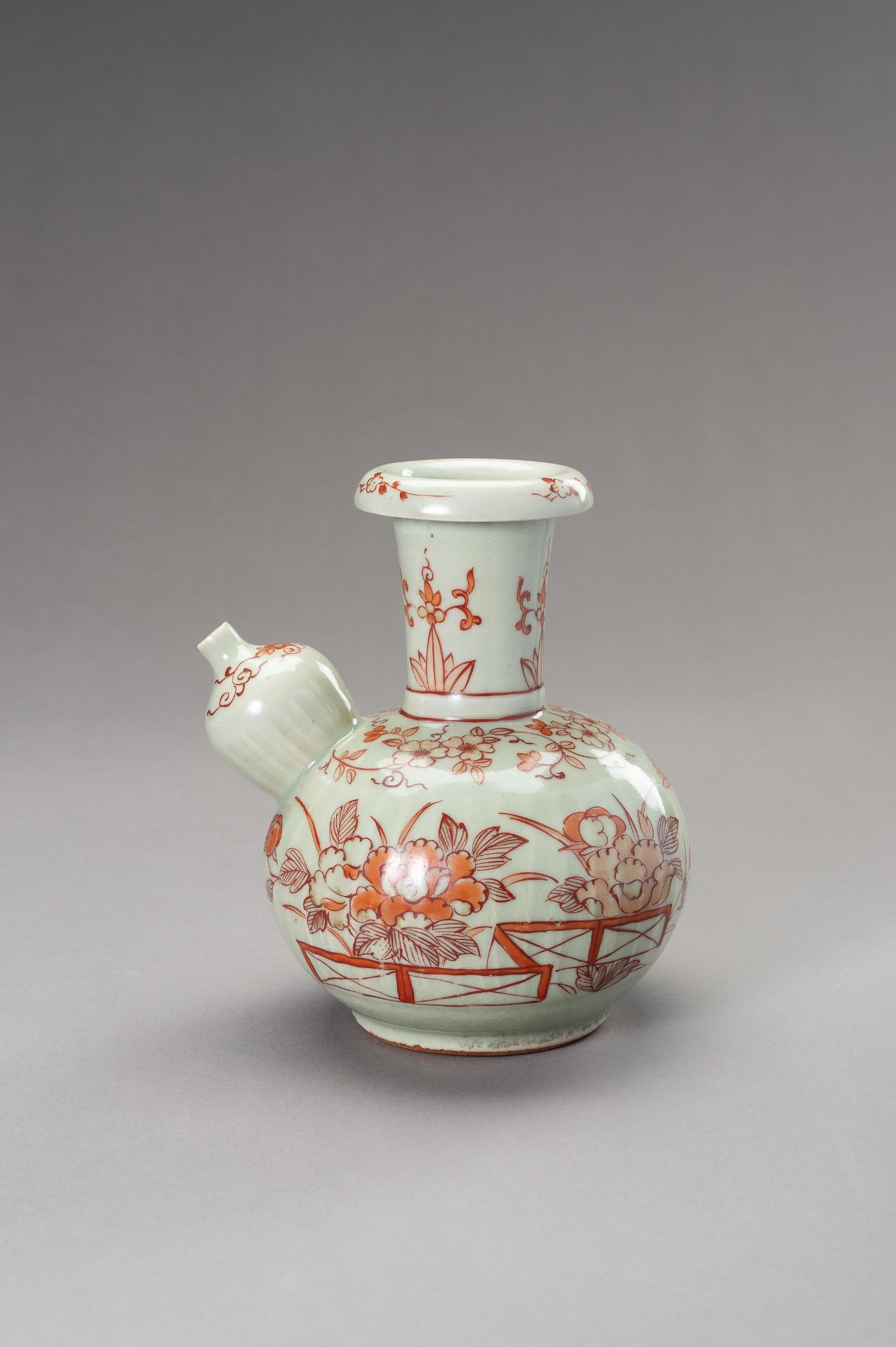 AN IMARI CELADON GROUND POURING VESSEL, KENDI, EDO PERIOD