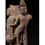 A PINK SANDSTONE ARCHITECTURAL CORNER ELEMENT WITH TWO MANIFESTATIONS OF SHIVA, CHANDELLA PERIOD