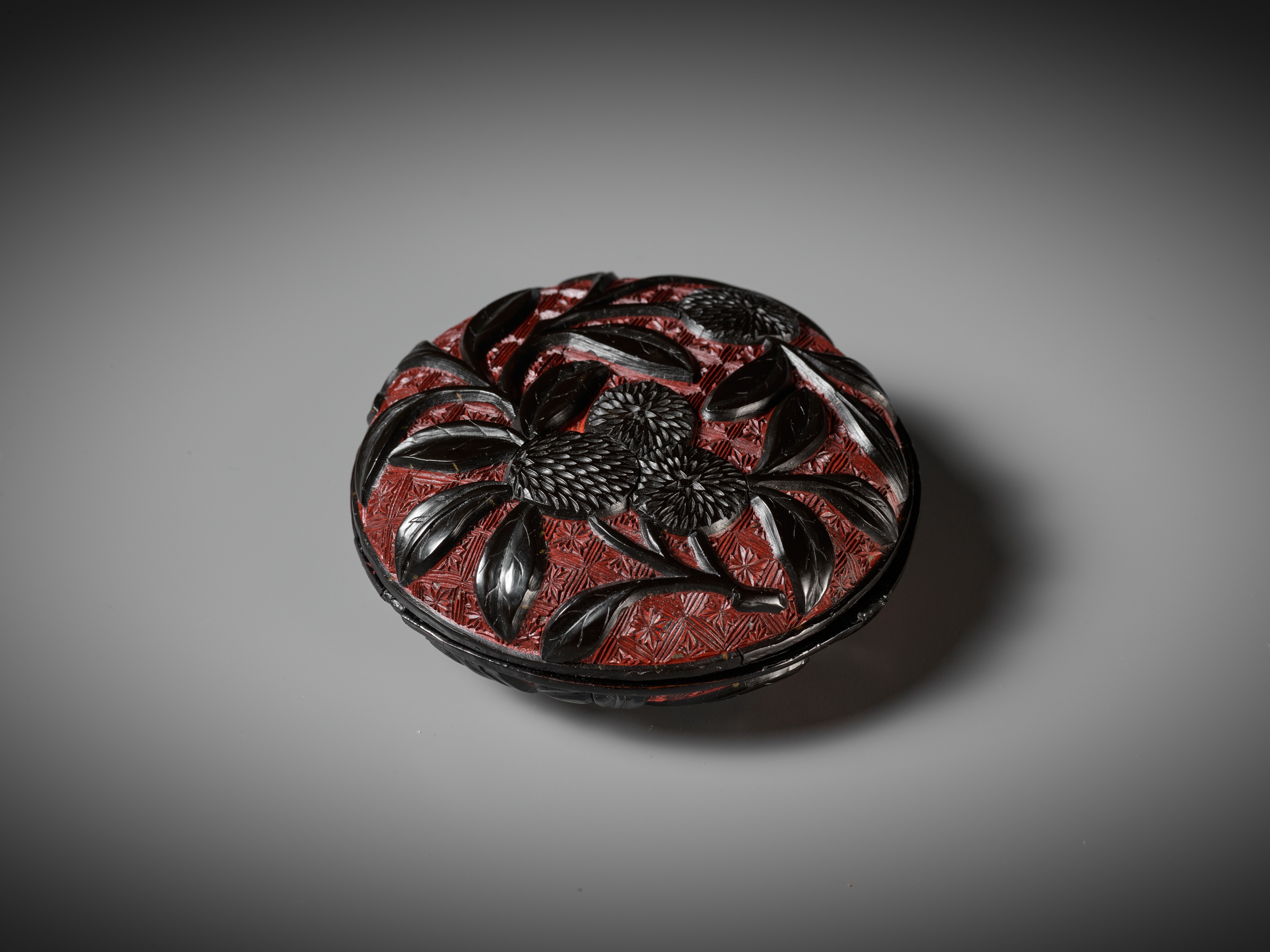 A PAIR OF RED AND BLACK LACQUER 'LYCHEE' BOXES AND COVERS, MING DYNASTY - Image 10 of 11