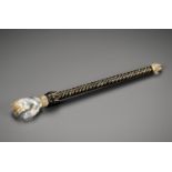 A FINELY CARVED ROCK CRYSTAL AND ONYX BACK SCRATCHER