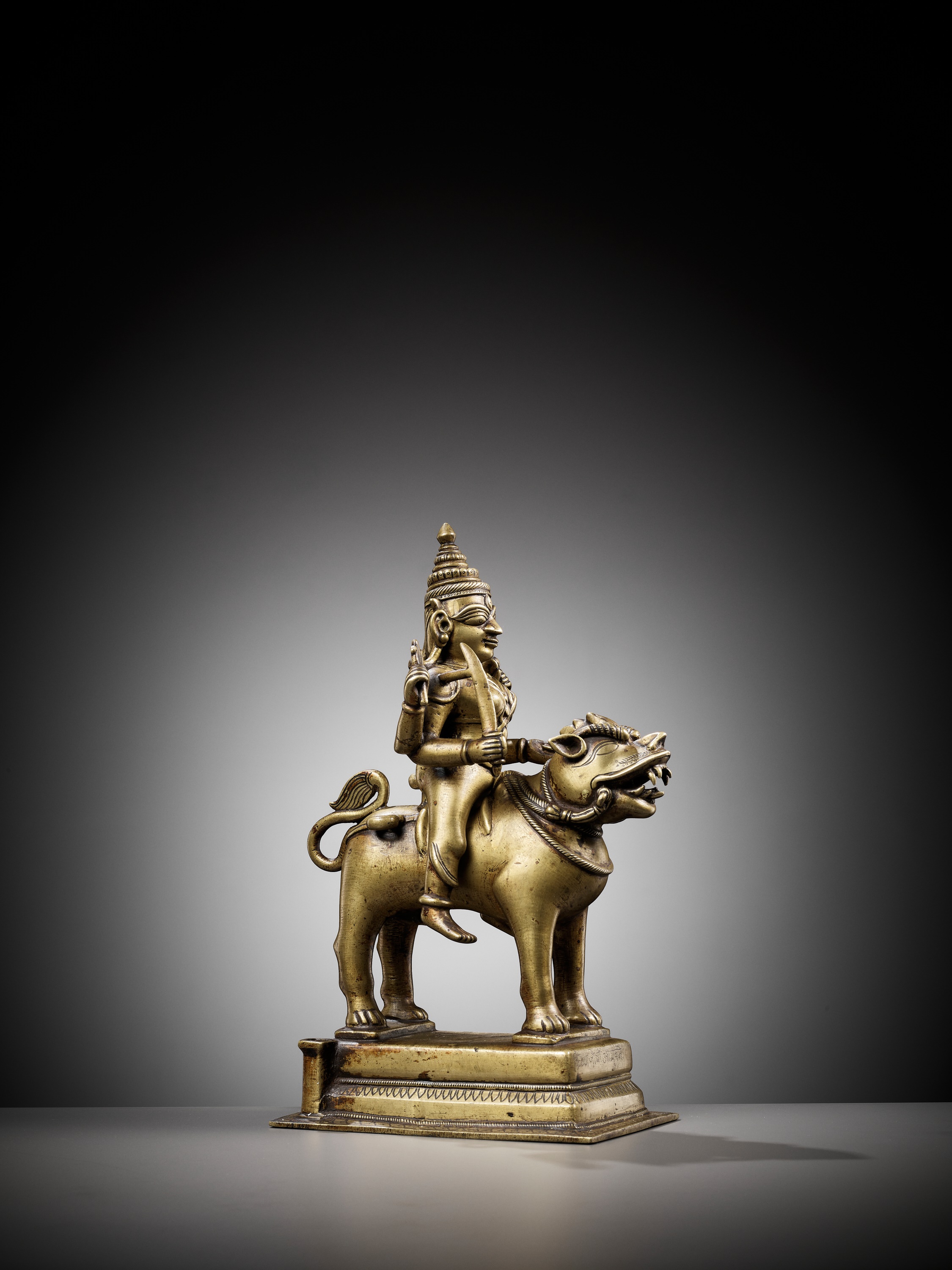 A BRONZE FIGURE OF DURGA RIDING A LION, INDIA, 15TH CENTURY - Image 3 of 11