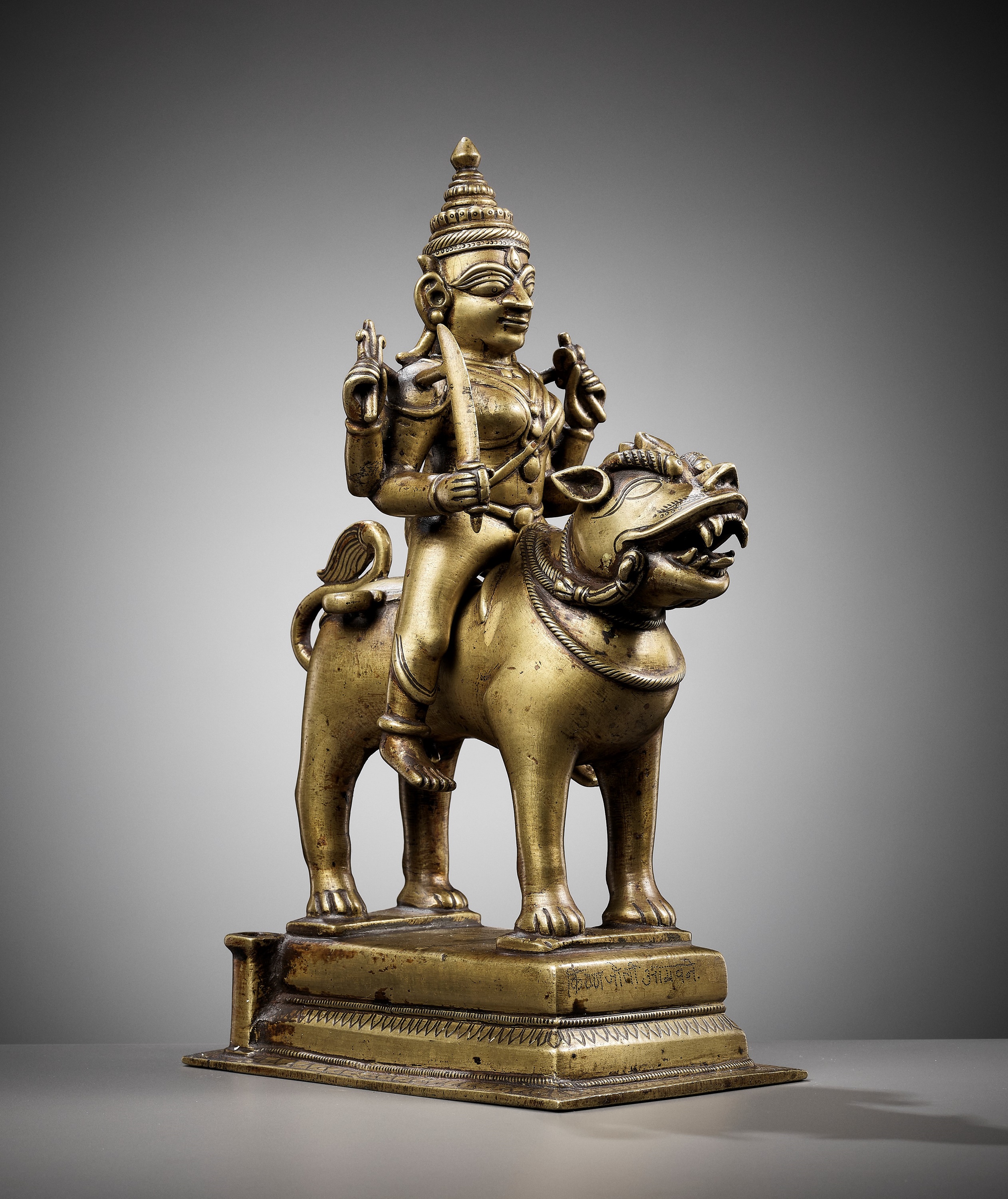 A BRONZE FIGURE OF DURGA RIDING A LION, INDIA, 15TH CENTURY - Image 2 of 11
