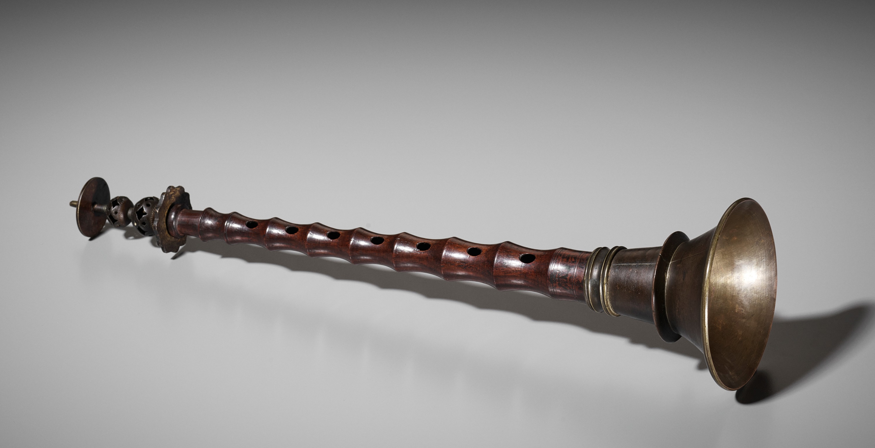 A BRASS AND WOOD OBOE, HAIDI, 18TH-19TH CENTURY
