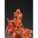A FINELY CARVED CORAL GROUP OF A MERMAID AND FISH, 20TH CENTURY