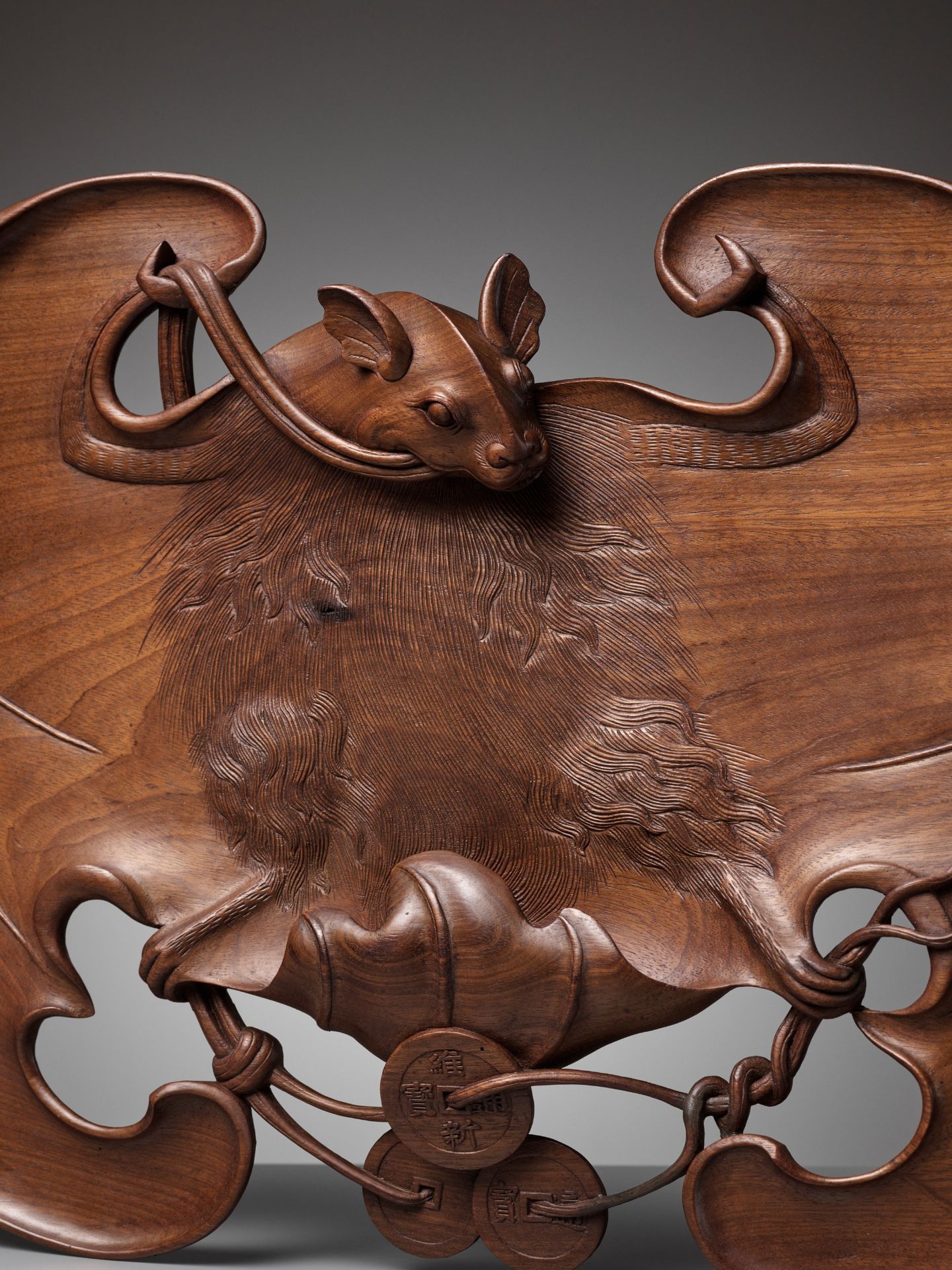 A CARVED 'BAT AND COINS' WOOD TRAY, NGUYEN DYNASTY, REIGN PERIOD OF DUY TAN