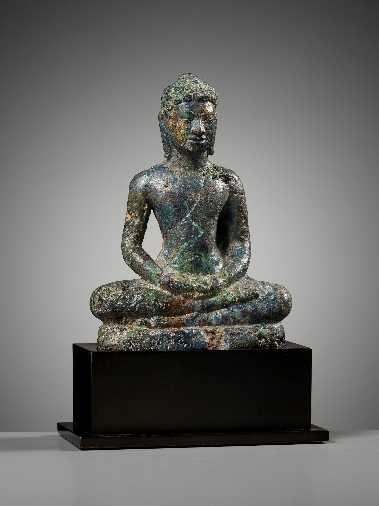 A BRONZE FIGURE OF BUDDHA, PRE-ANGKOR PERIOD