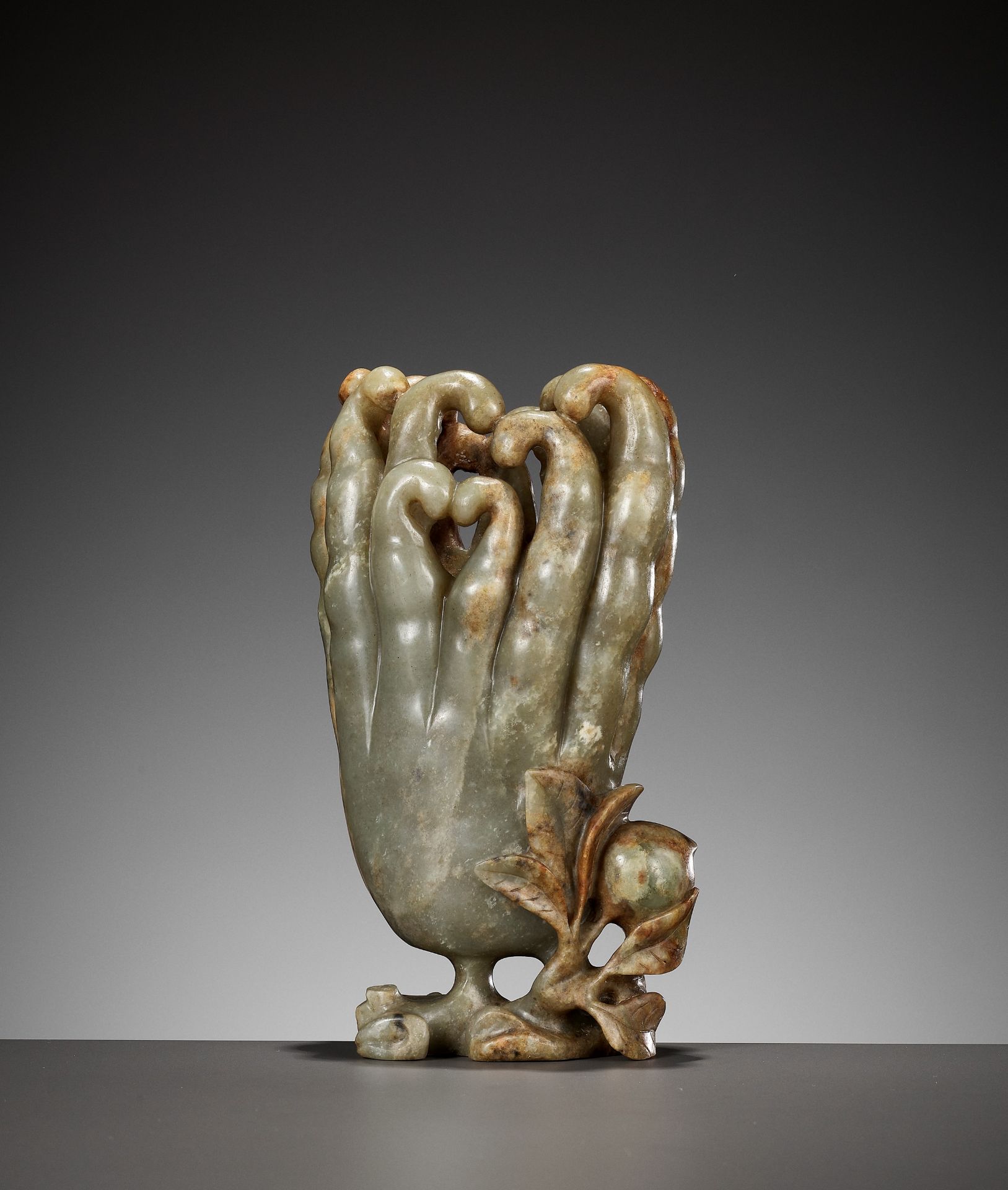 A CELADON AND RUSSET JADE 'FINGER CITRON' VASE, 17TH - 18TH CENTURY