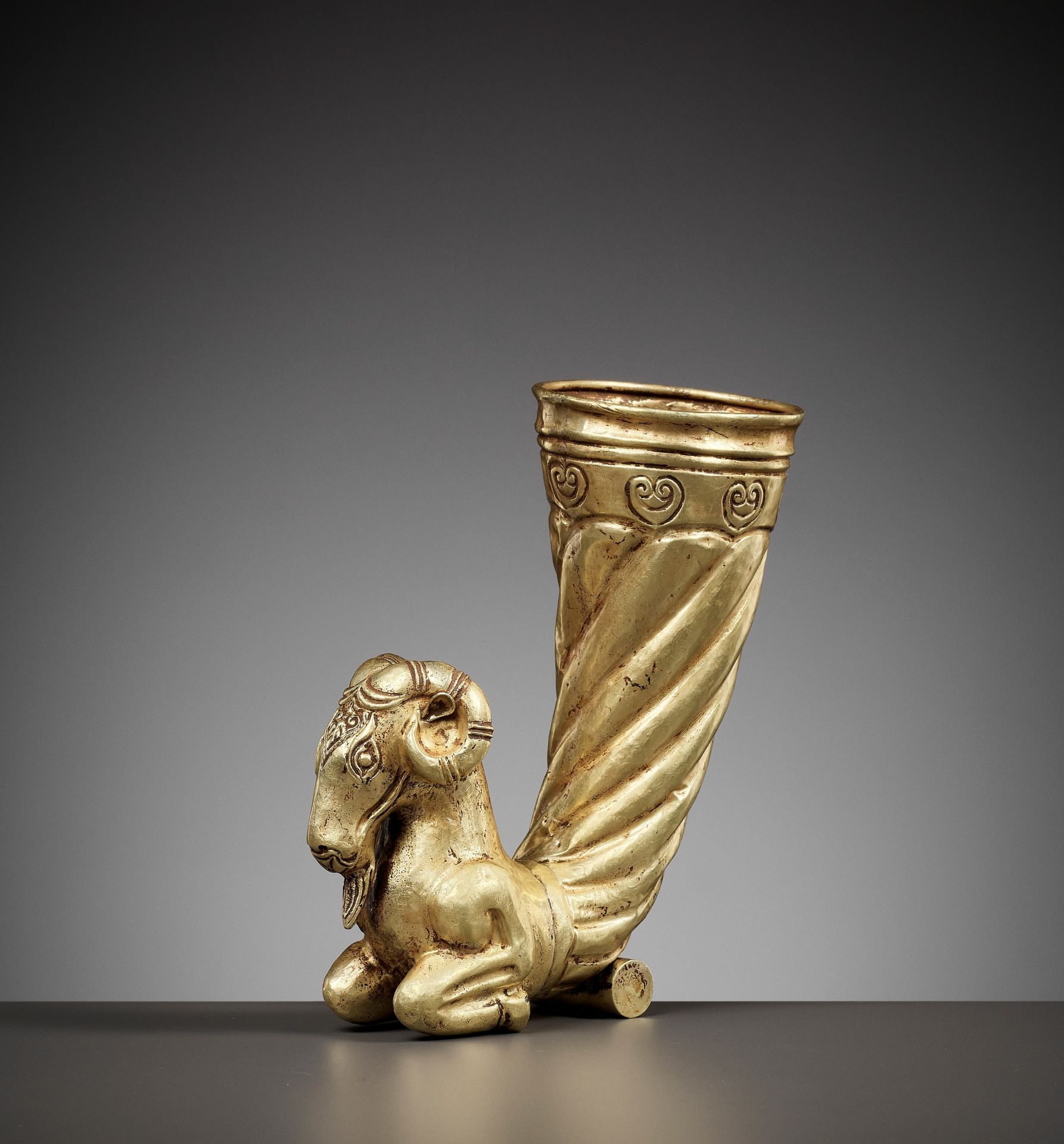 A WESTERN ASIATIC RAM-FORM GOLD RHYTON, CIRCA 5TH - 10TH CENTURY AD