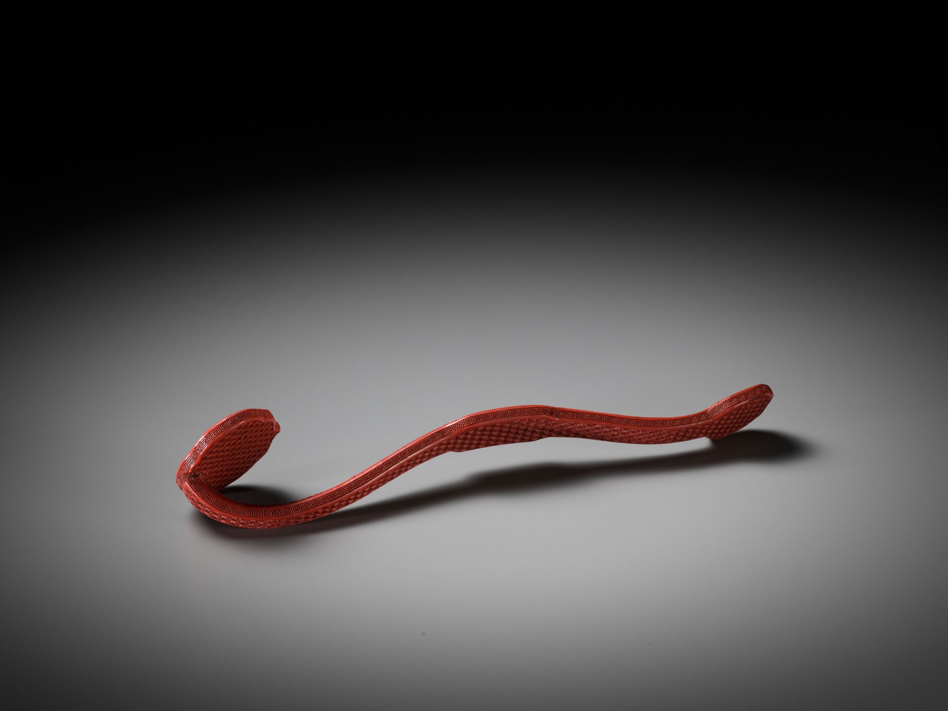 A CARVED CINNABAR LACQUER 'BAJIXIANG' RUYI SCEPTER, QING DYNASTY - Image 7 of 10