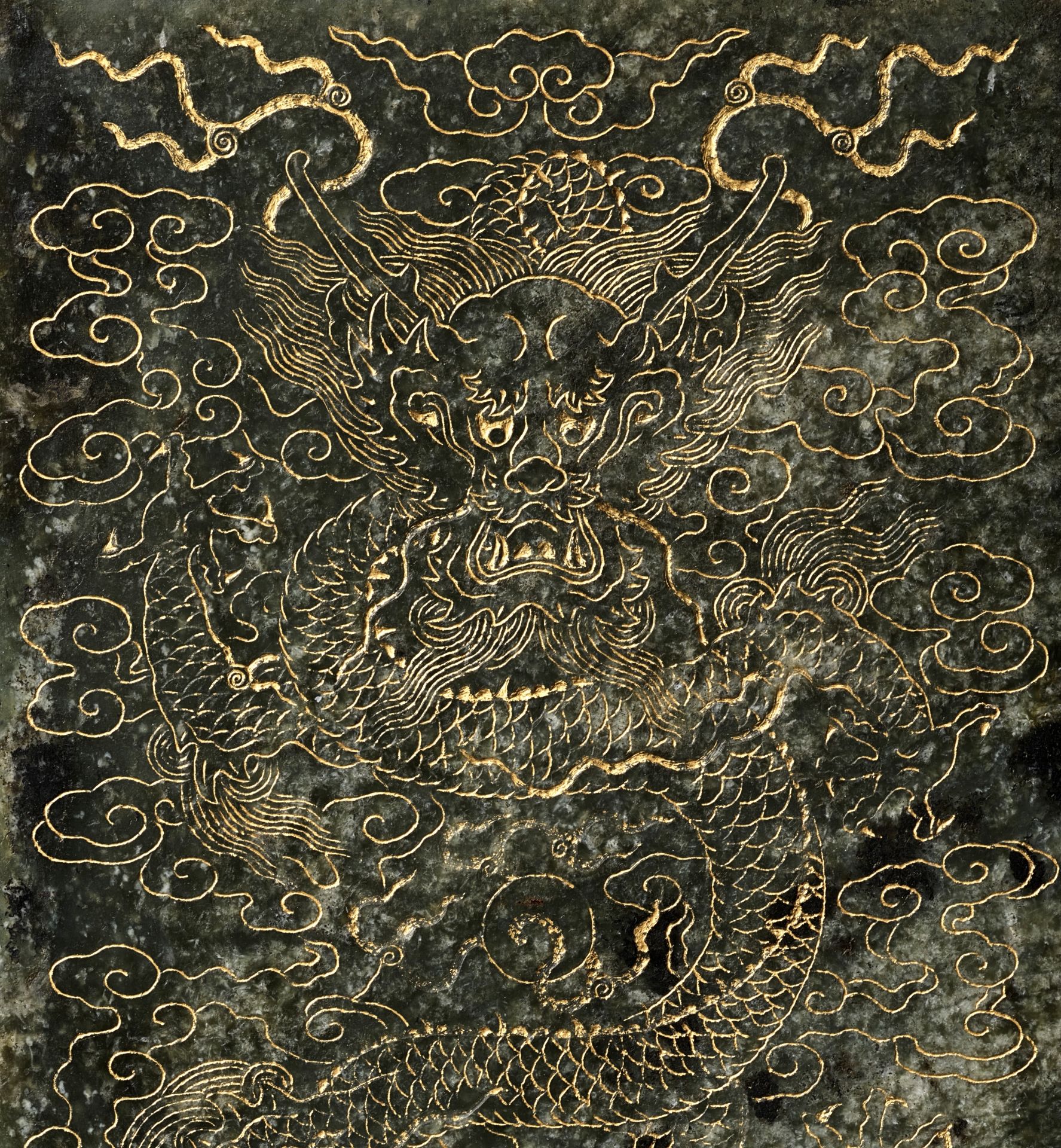 AN IMPERIAL 'YUNLONG' BOOK COVER, INSCRIBED BY EMPEROR QIANLONG, CARVED SPINACH-GREEN JADE, DATED BI