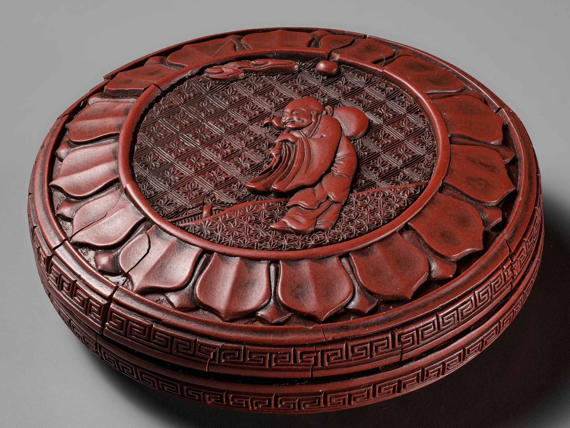 A CINNABAR LACQUER 'LUOHAN' BOX AND COVER, YUAN TO EARLY MING DYNASTY - Image 13 of 14