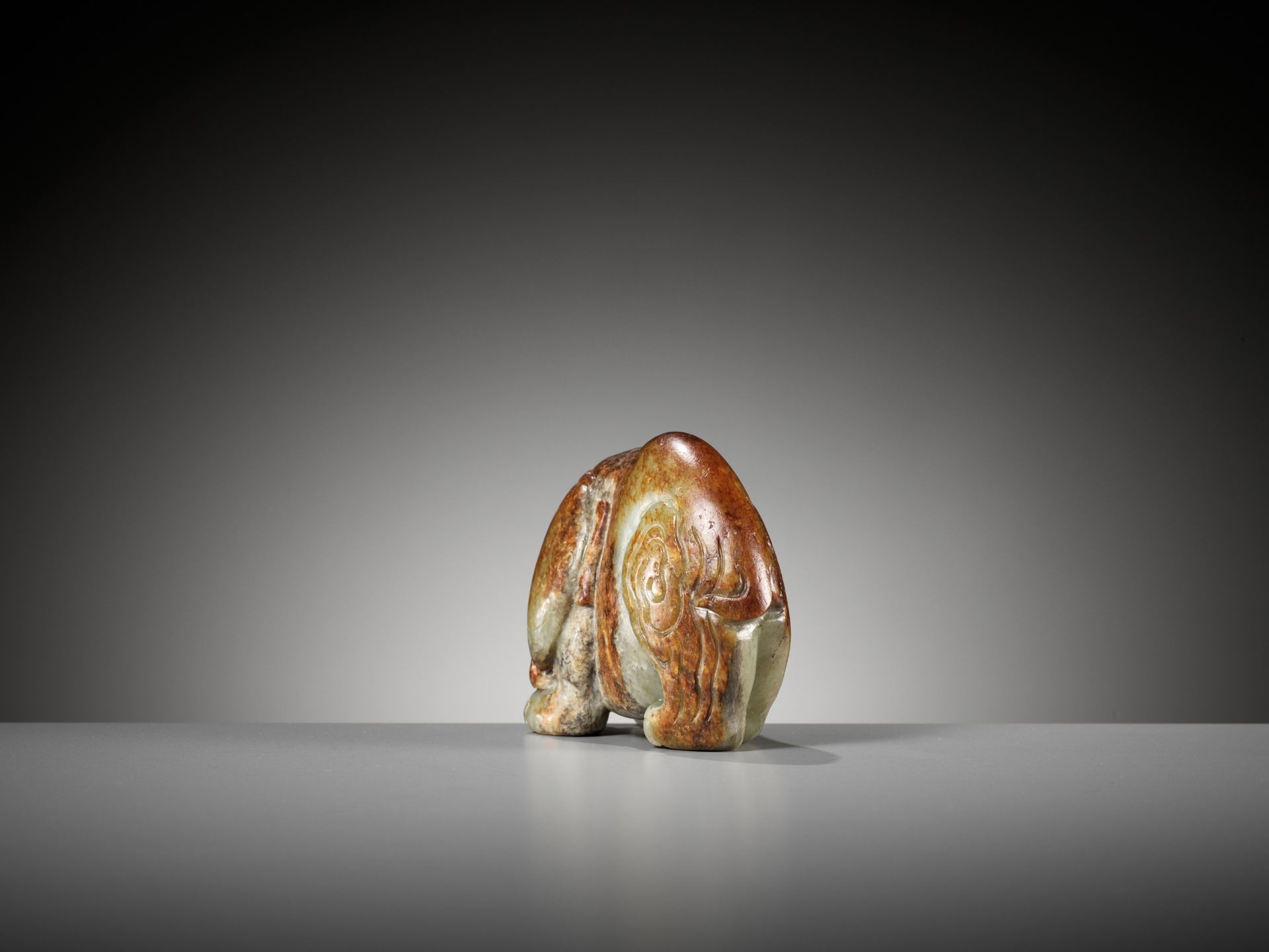 A CELADON AND RUSSET JADE FIGURE OF AN ELEPHANT, MING DYNASTY - Image 6 of 11