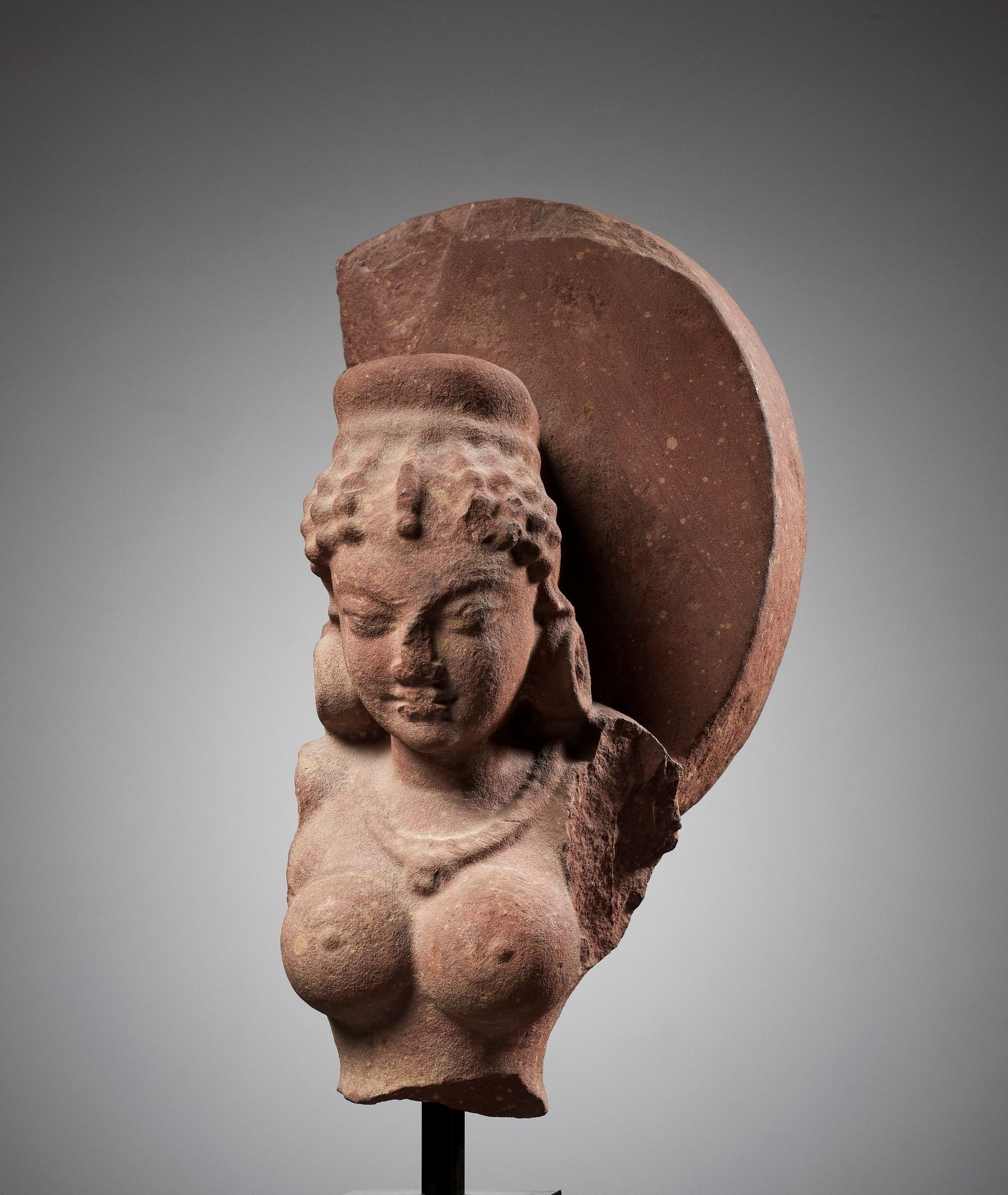 A PINK SANDSTONE BUST OF A GODDESS, GUPTA PERIOD