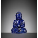 A LAPIS LAZULI FIGURE OF BUDDHA, QING DYNASTY