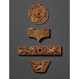 A RARE AND COMPLETE SET OF FOUR JADE OPENWORK SWORD FITTINGS, WESTERN HAN DYNASTY