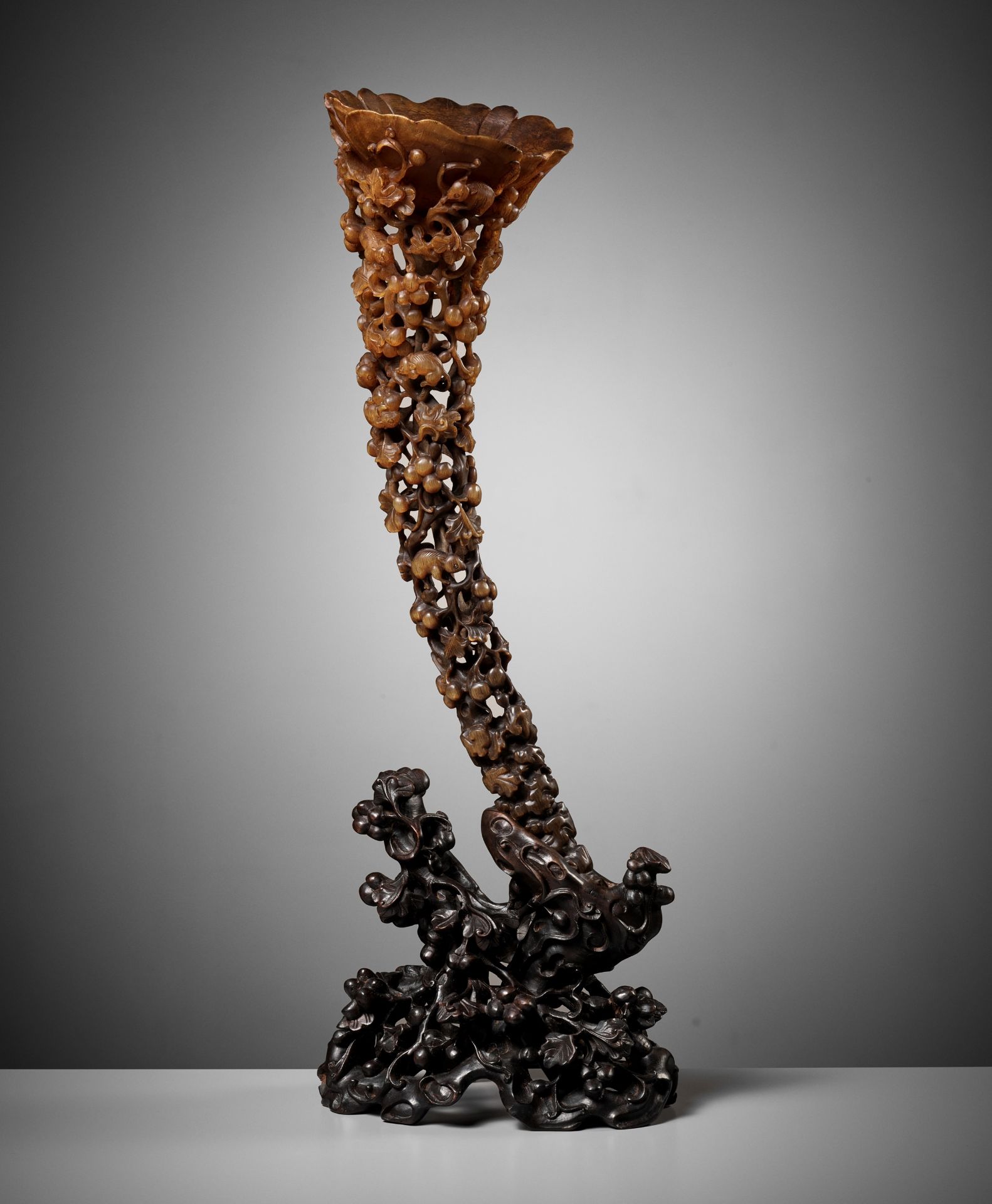 A LARGE FULL-TIP RHINOCEROS HORN CUP, 19TH CENTURY