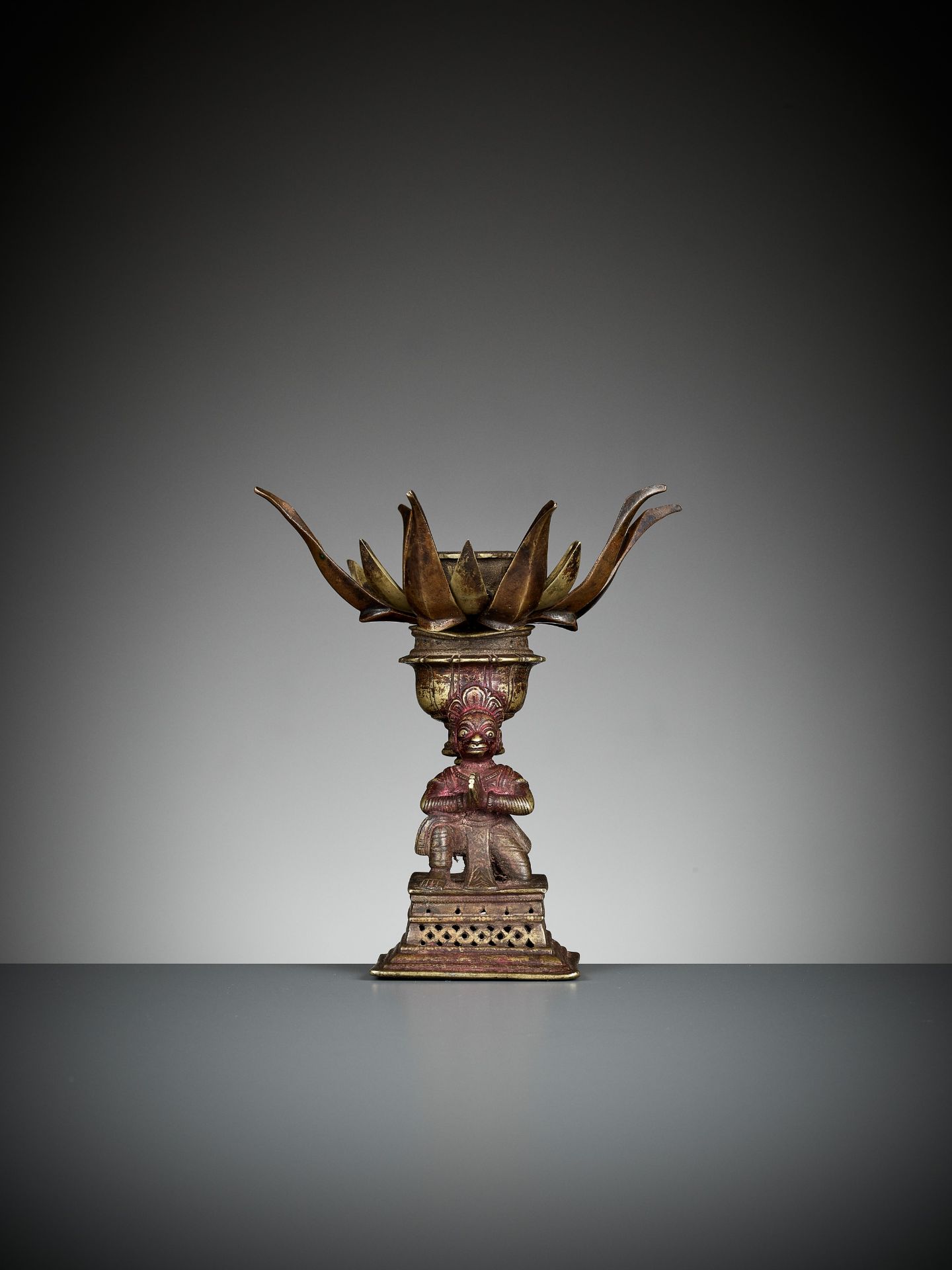 A BRONZE 'LOTUS MANDALA' LINGAM STAND WITH HANUMAN - Image 6 of 12