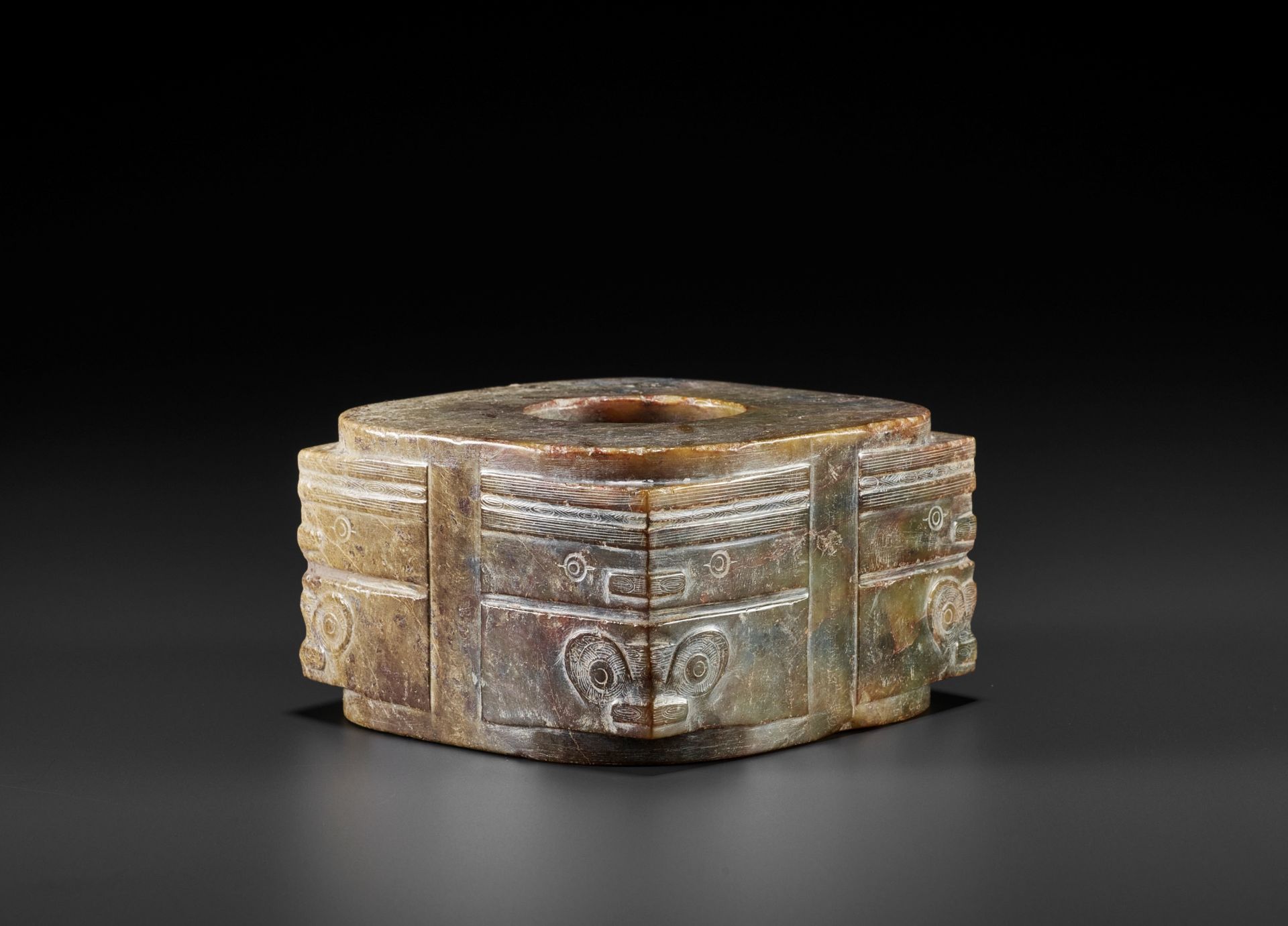 A RARE AND MASSIVE MOTTLED JADE CONG, LIANGZHU CULTURE