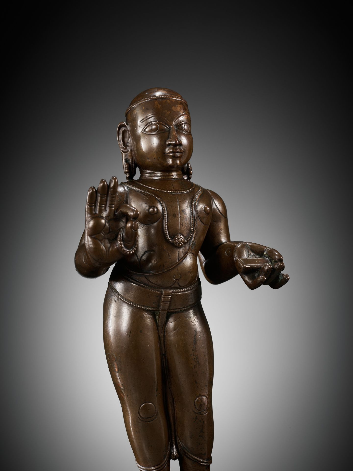 A LARGE COPPER ALLOY FIGURE OF MANIKKAVACAKAR, TAMIL NADU, 14TH-15TH CENTURY - Image 3 of 16