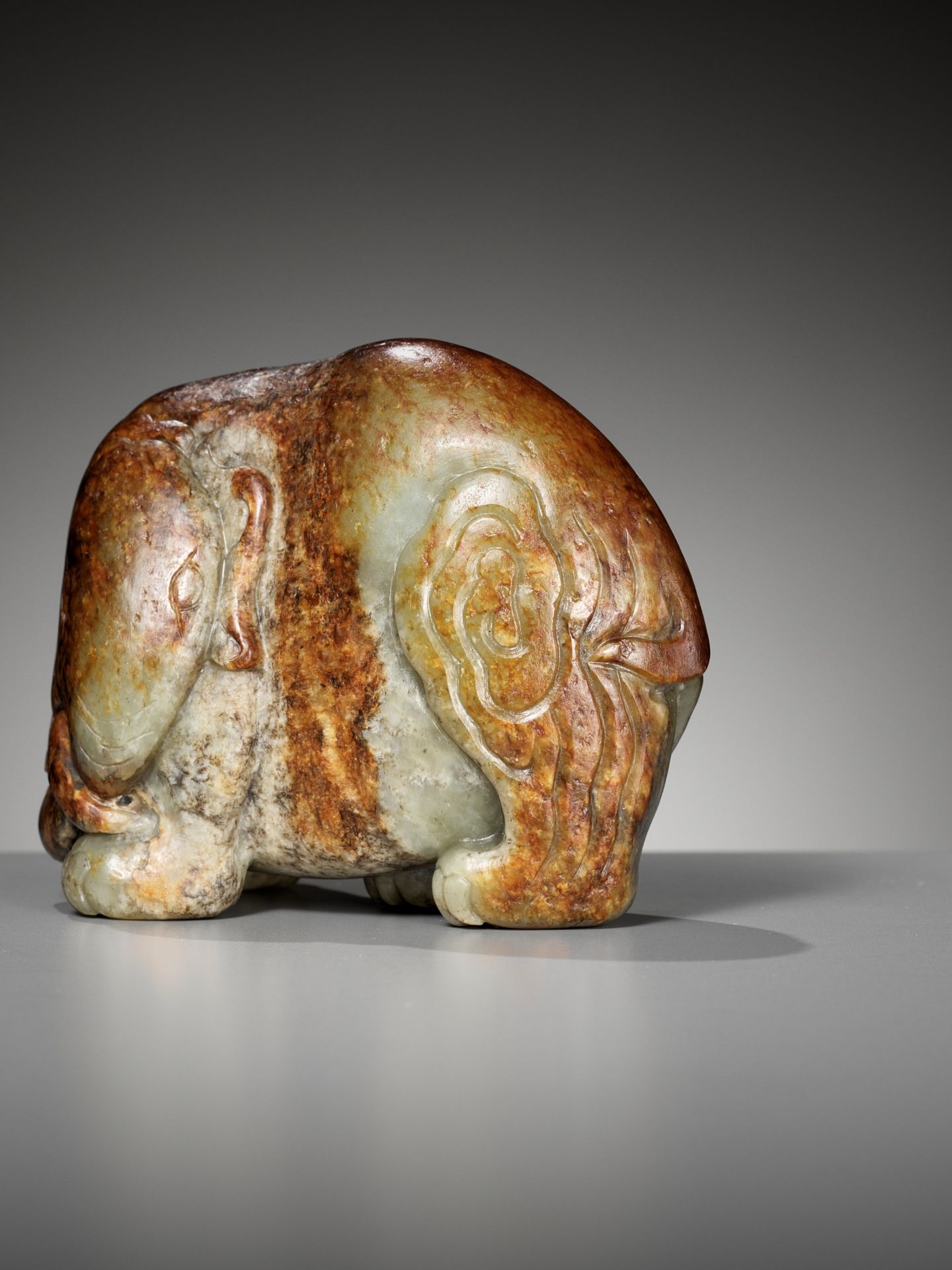 A CELADON AND RUSSET JADE FIGURE OF AN ELEPHANT, MING DYNASTY - Image 11 of 11