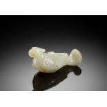 A CELADON JADE 'TURTLEDOVE' FINIAL, JIU, HAN DYNASTY