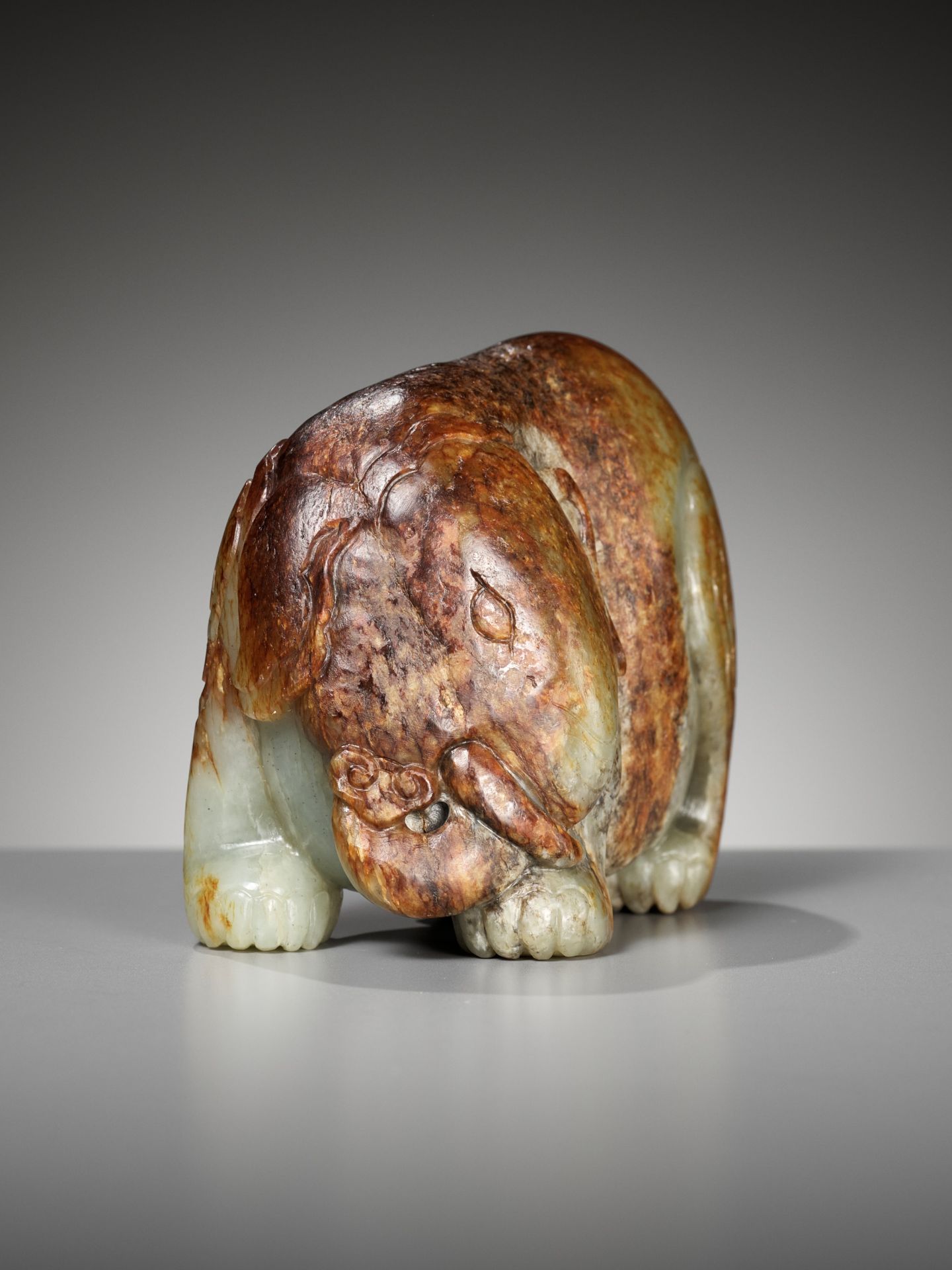 A CELADON AND RUSSET JADE FIGURE OF AN ELEPHANT, MING DYNASTY - Image 10 of 11