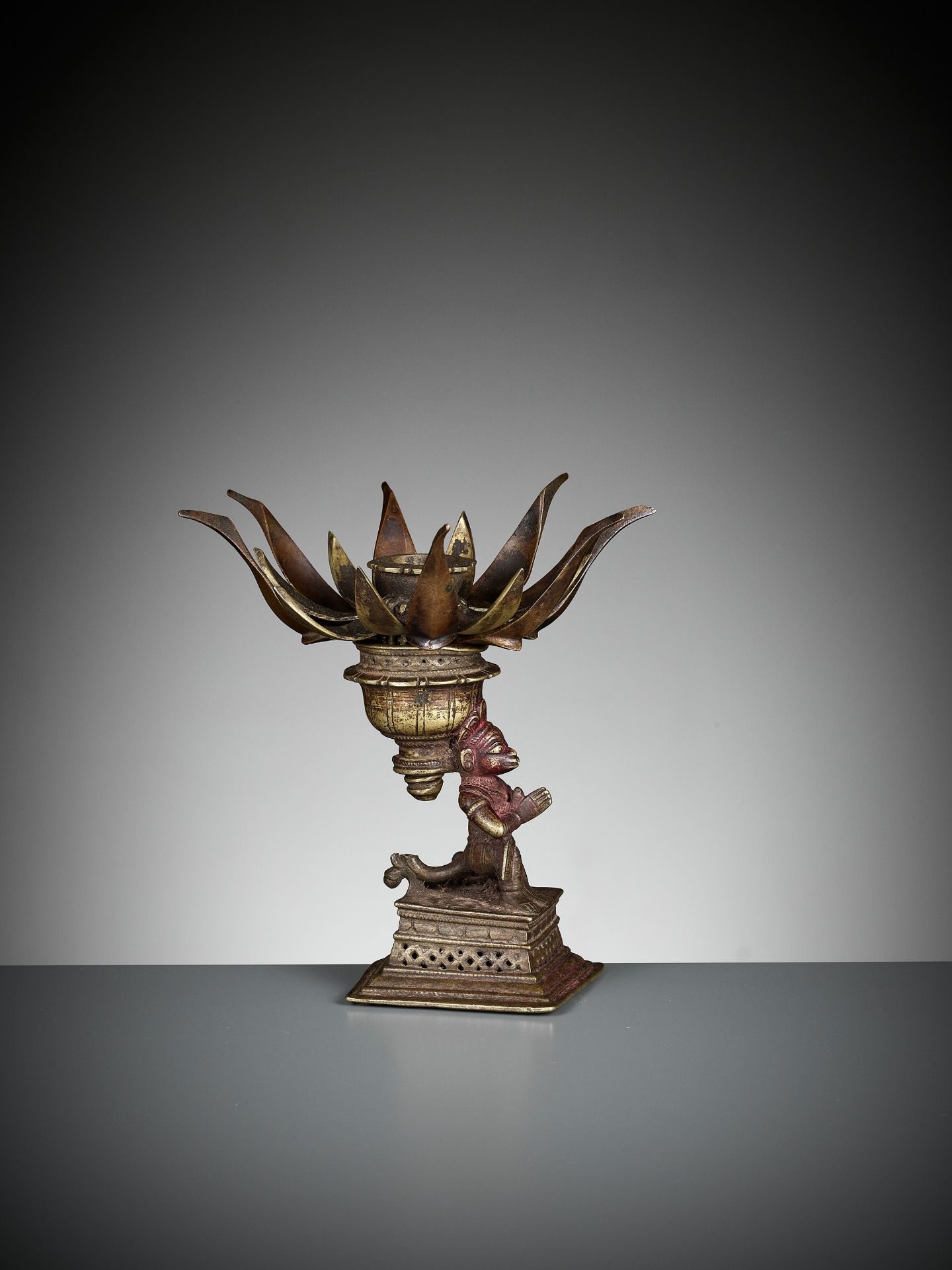 A BRONZE 'LOTUS MANDALA' LINGAM STAND WITH HANUMAN - Image 11 of 12