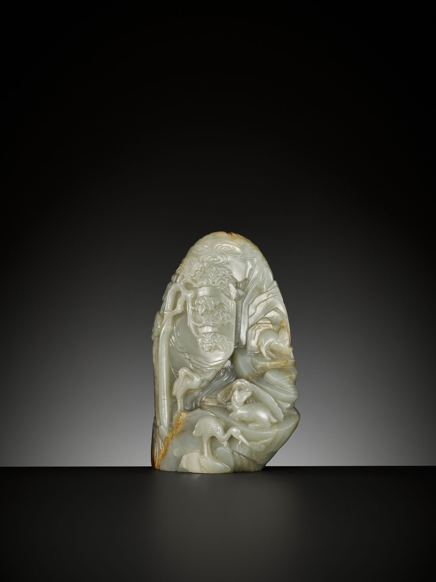 A CELADON AND RUSSET JADE 'DEER AND CRANE' BOULDER, 18TH CENTURY - Image 10 of 15