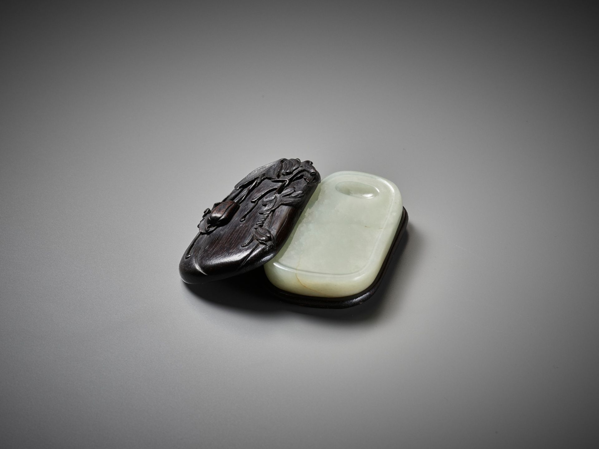 A PALE CELADON JADE INKSTONE WITH MATCHING ZITAN STAND AND COVER, QING DYNASTY - Image 2 of 9