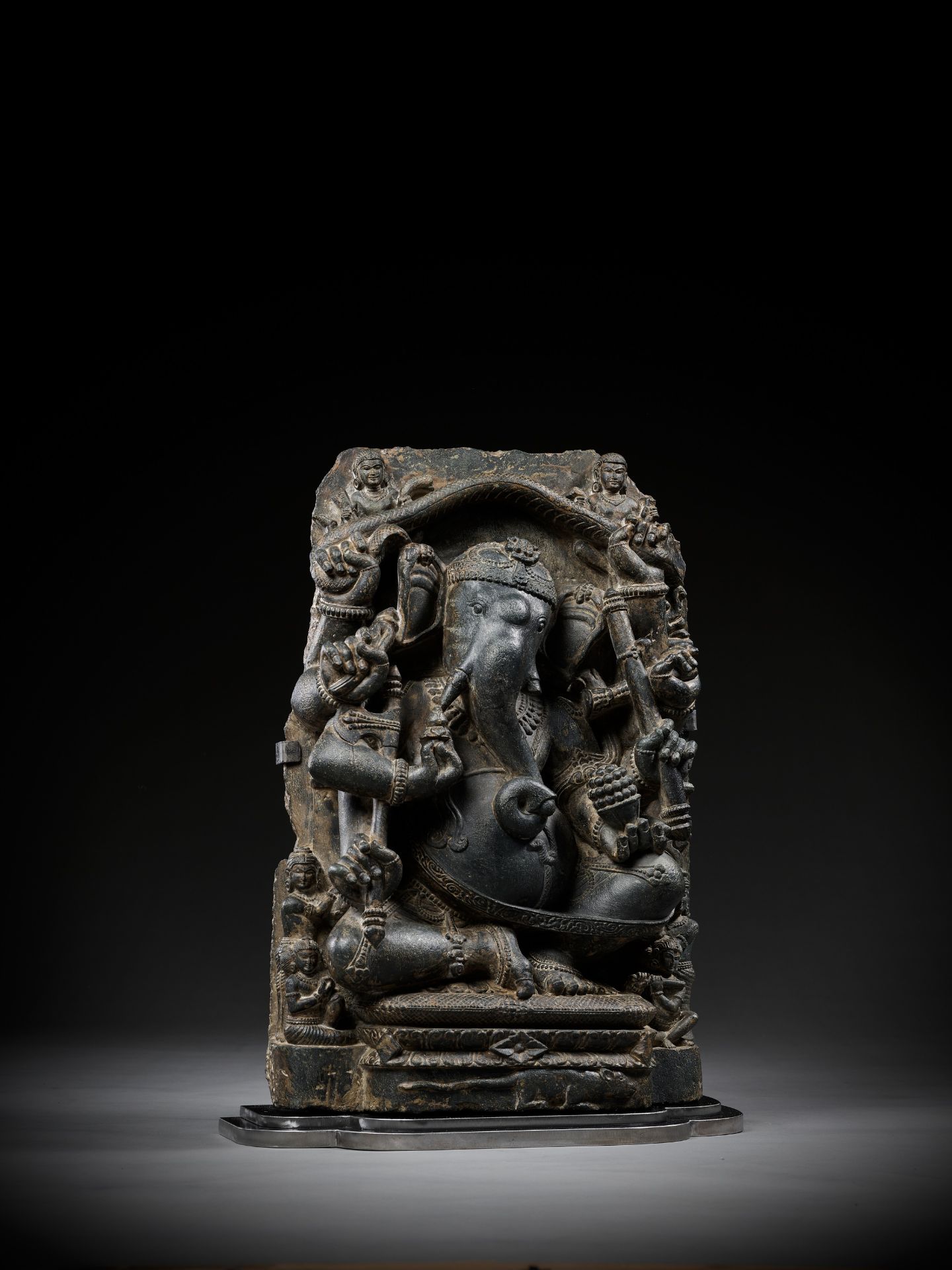 A BLACK SCHIST FIGURE OF GANESHA WITH A SNAKE MANDORLA, PALA PERIOD - Image 16 of 16