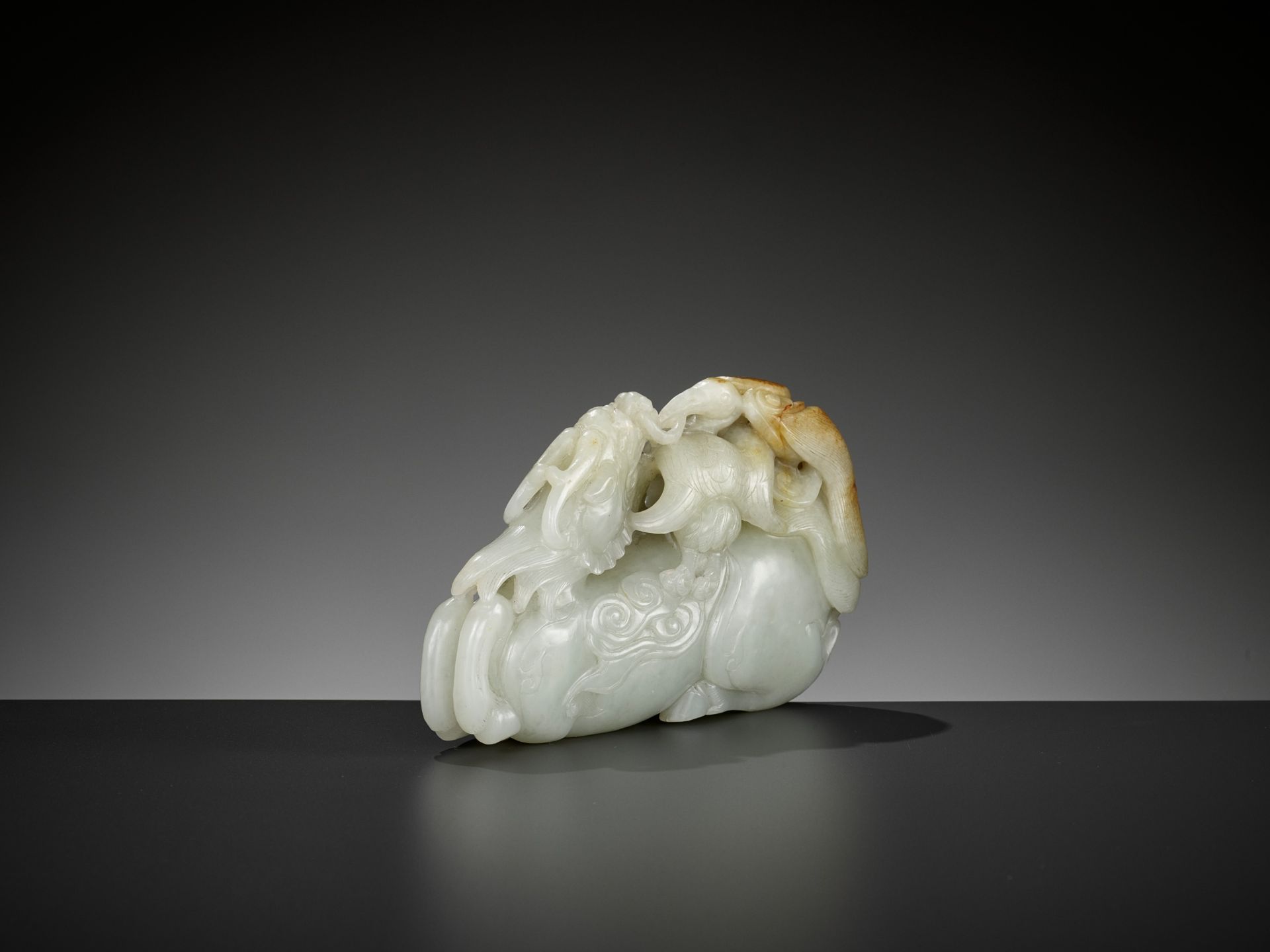 A CELADON AND RUSSET JADE 'QILIN AND CRANES' GROUP, 18TH CENTURY - Image 7 of 11