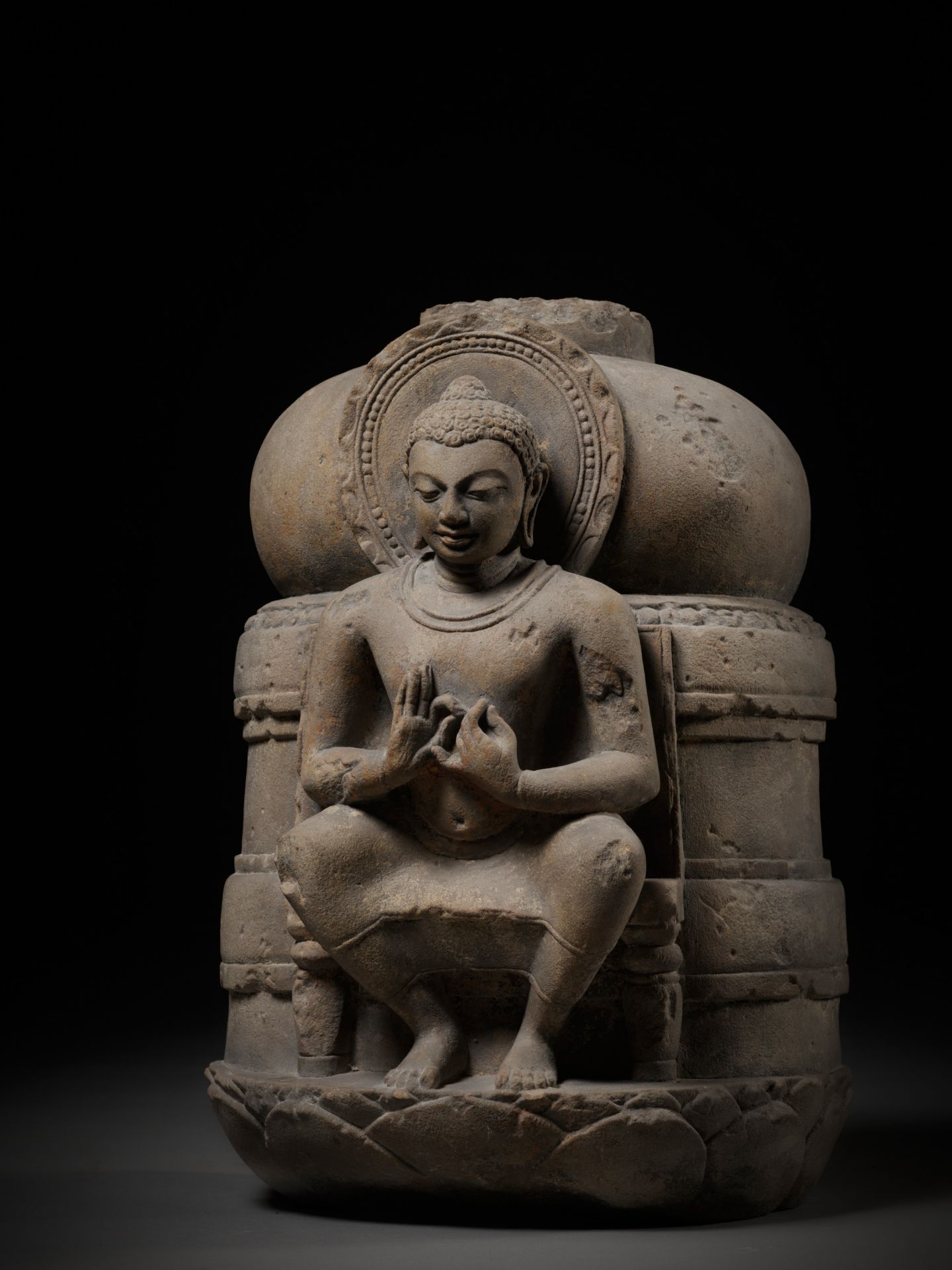 A SANDSTONE STUPA DOME FRAGMENT DEPICTING BUDDHA, POST-GUPTA PERIOD