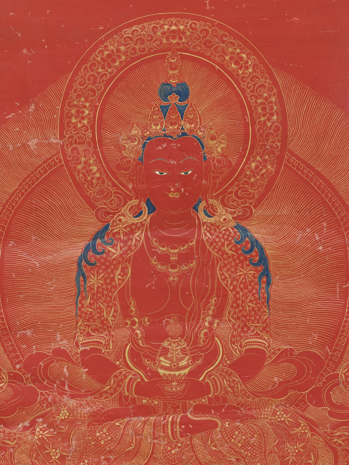 A RED-GROUND AND GILT THANGKA OF AMITAYUS, WULIANG SHOUFO