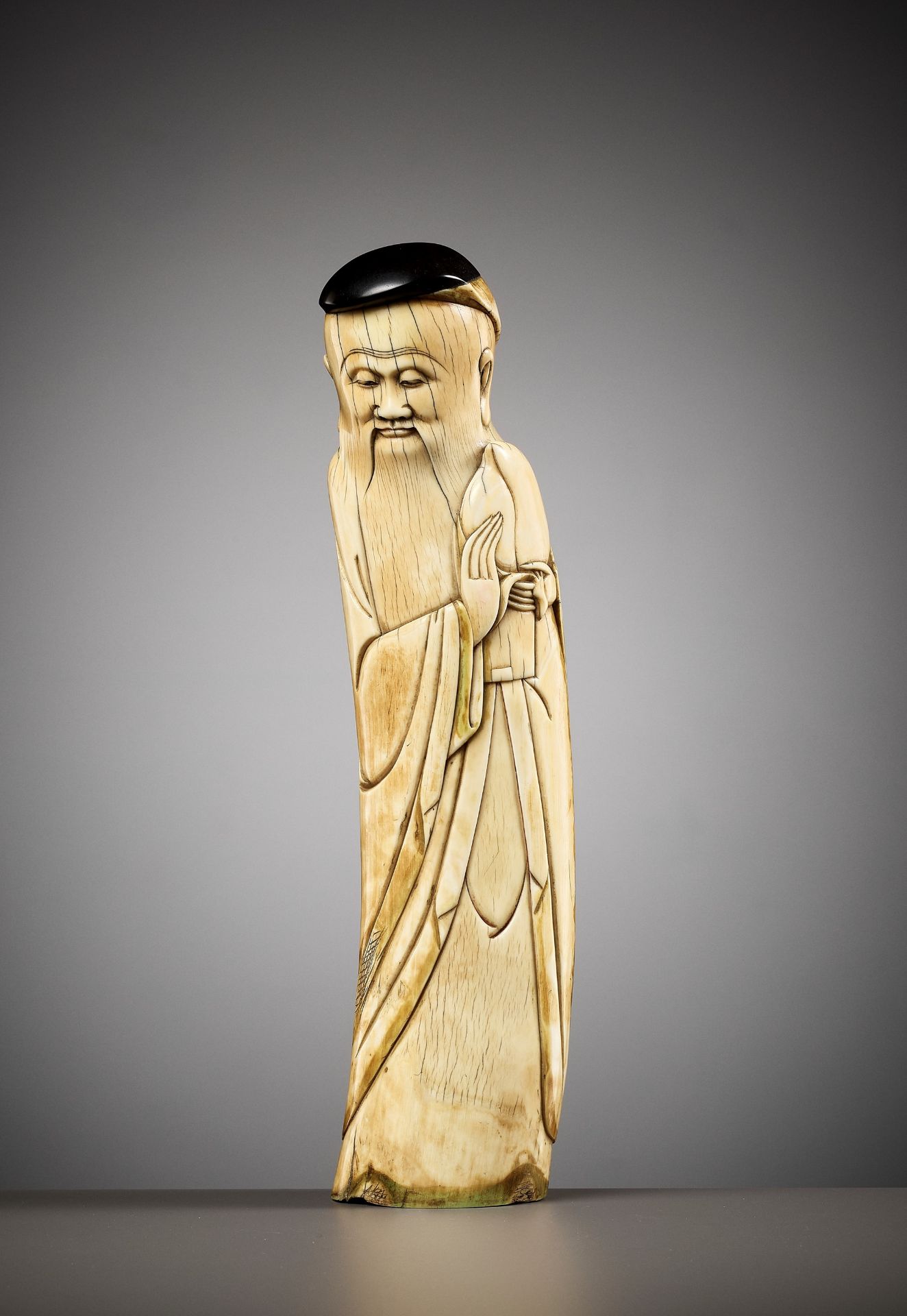 AN IVORY FIGURE OF SHOULAO, MING DYNASTY