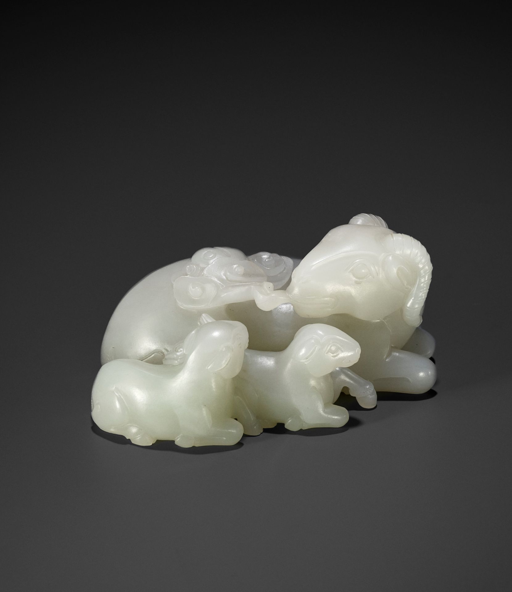 A RARE PALE CELADON JADE 'SANYANG AND TAIJITU' GROUP, 18TH CENTURY