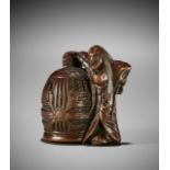 TAMETAKA: A RARE WOOD NETSUKE OF KIYOHIME