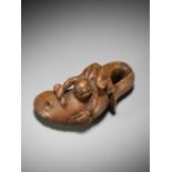 RANTEI: A VERY RARE WOOD NETSUKE OF KADORI MYOJIN WITH NAMAZU