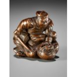 A SUPERB WOOD NETSUKE OF INO HAYATA SLAYING THE NUE