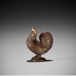 A RARE WOOD NETSUKE OF A COCKEREL ON AWABI